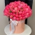 Композиция в шляпной коробке из 113 пионов Корал Шарм в Луховицах Композиция в шляпной коробке из 113 пионов Корал Шарм в Луховицах